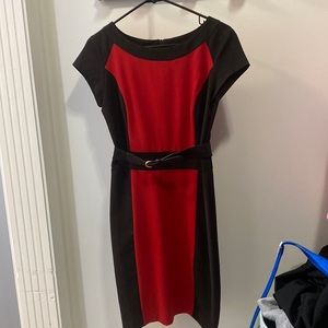 Very nice red and black fitted business dress.